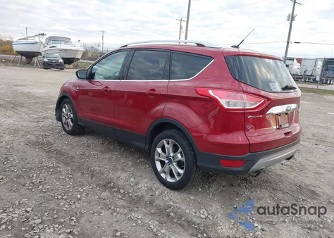 2015 Ford Escape Titanium z USA, uszkodzony, nr VIN 1FMCU9J90FUB74988